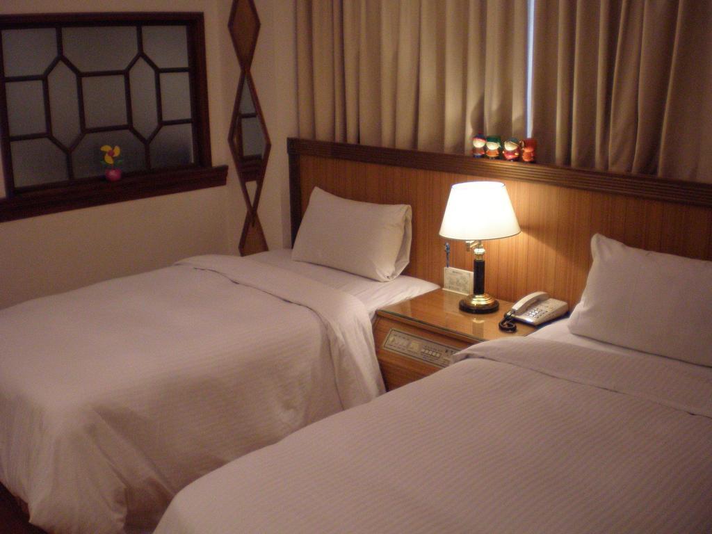 Emperor Hotel Kaohsziung Szoba fotó